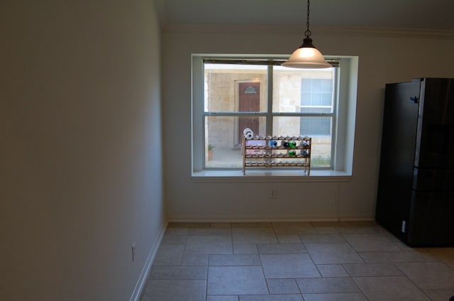 4216 Veiled Falls Dr, Pflugerville, TX 78660 - unfurnished dining area featuring ornamental molding and baseboards
