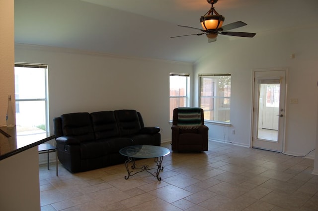 4216 Veiled Falls Dr, Pflugerville, TX 78660 - living area featuring vaulted ceiling, crown molding, and ceiling fan