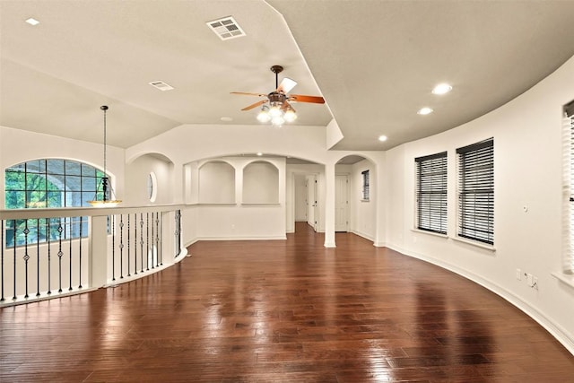 2908 Arbor Ct, Round Rock, TX 78681 - empty room with a ceiling fan, hardwood / wood-style flooring, recessed lighting, vaulted ceiling, and arched walkways