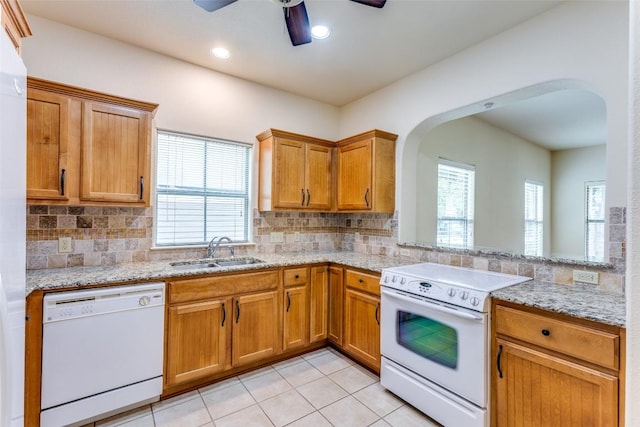 13604 Caldwell Dr Unit 72, Austin, TX 78750 - kitchen featuring white appliances, arched walkways, healthy amount of natural light, ceiling fan, and recessed lighting