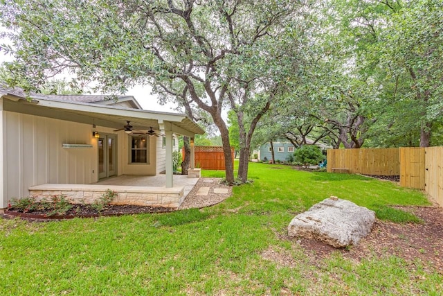 13604 Caldwell Dr Unit 72, Austin, TX 78750 - fenced yard with ceiling fan and a patio