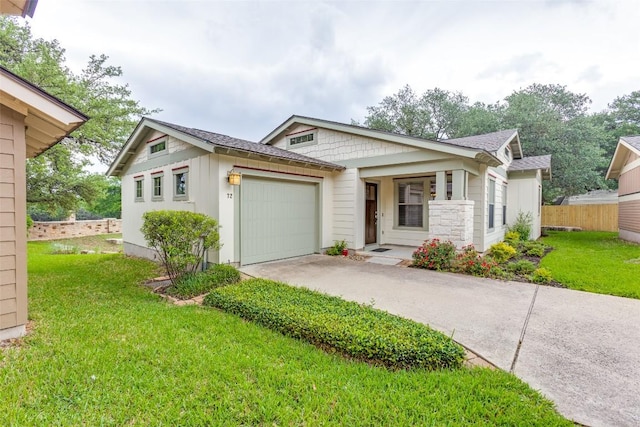 13604 Caldwell Dr Unit 72, Austin, TX 78750 - view of front of house with an attached garage, concrete driveway, and a shingled roof