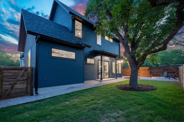 6406 Cannonleague Dr Unit 2, Austin, TX 78745 - rear view of house with a fenced backyard, a patio area, and a gate