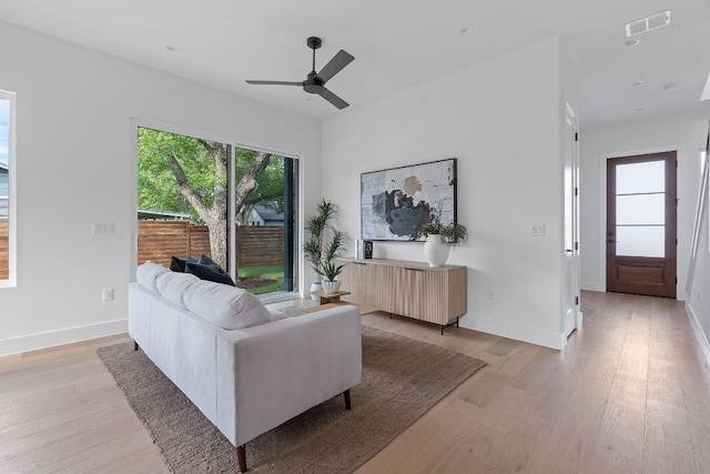 6406 Cannonleague Dr Unit 2, Austin, TX 78745 - living area with light wood-style floors and ceiling fan