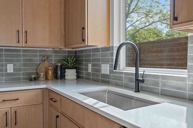 6406 Cannonleague Dr Unit 2, Austin, TX 78745 - kitchen with light countertops and tasteful backsplash