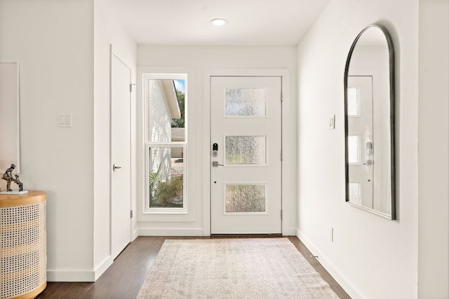 2709 Jorwoods Dr, Austin, TX 78745 - entryway featuring baseboards and dark wood-style floors
