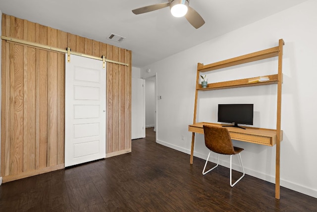 2709 Jorwoods Dr, Austin, TX 78745 - office space featuring wood finished floors, a ceiling fan, and a barn door