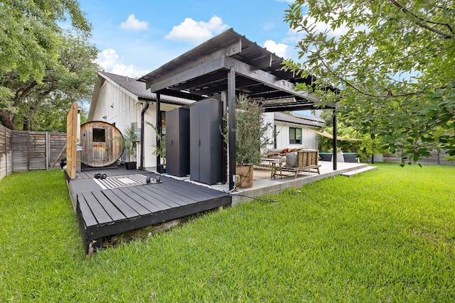 2709 Jorwoods Dr, Austin, TX 78745 - rear view of house featuring a fenced backyard, a deck, a patio area, and an outdoor hangout area