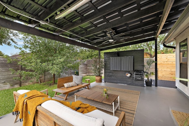 2709 Jorwoods Dr, Austin, TX 78745 - fenced backyard featuring a ceiling fan, a patio area, and outdoor lounge area