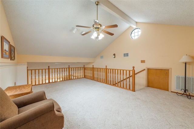 344 Fm 2984th Rd, Luling, TX 78648 - sitting room with ceiling fan, carpet floors, and an upstairs landing