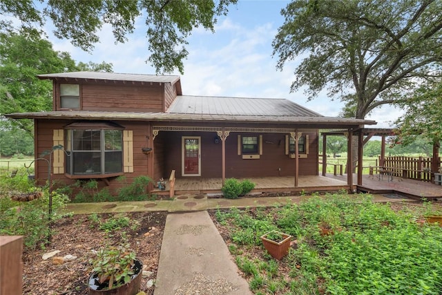 344 Fm 2984th Rd, Luling, TX 78648 - view of front of property featuring a metal roof and covered porch