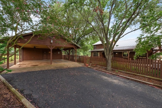344 Fm 2984th Rd, Luling, TX 78648 - view of front of house with asphalt driveway and a carport