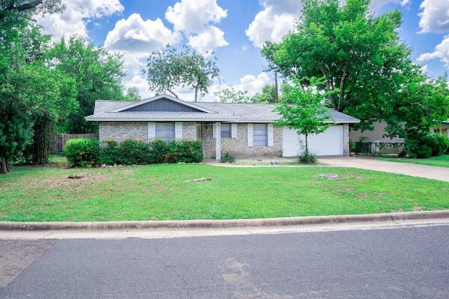 8204 Easter Cv, Austin, TX 78757 - single story home with driveway, an attached garage, and brick siding