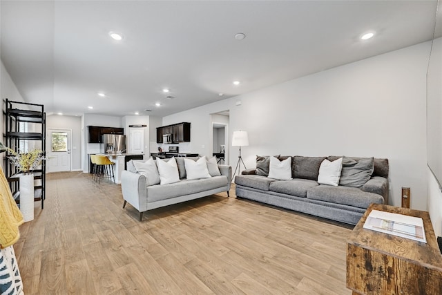 3032 Maryanne Ln, Pflugerville, TX 78660 - living area with light wood finished floors and recessed lighting