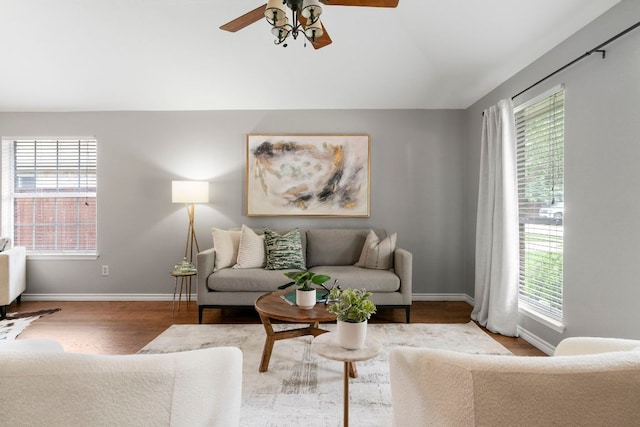 5205 Encinitas Ln, Austin, TX 78749 - living room featuring healthy amount of natural light, a ceiling fan, wood finished floors, and lofted ceiling