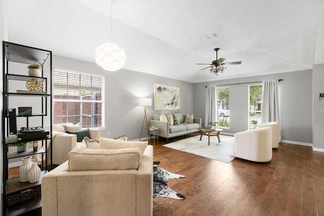 5205 Encinitas Ln, Austin, TX 78749 - living area featuring a ceiling fan, dark wood-style floors, and vaulted ceiling