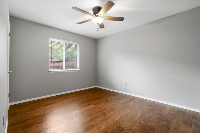 5205 Encinitas Ln, Austin, TX 78749 - empty room with dark wood finished floors and a ceiling fan