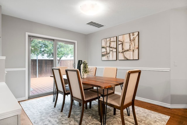 5205 Encinitas Ln, Austin, TX 78749 - dining area featuring baseboards and wood finished floors