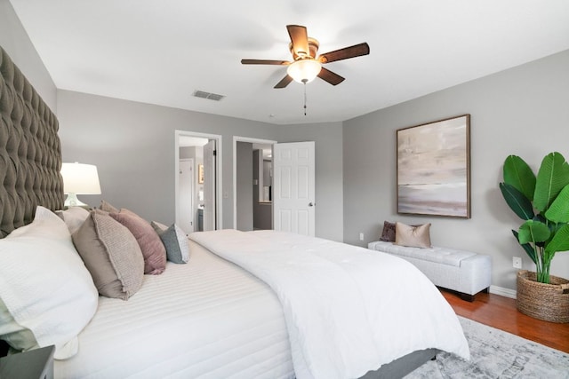 5205 Encinitas Ln, Austin, TX 78749 - bedroom featuring wood finished floors and a ceiling fan