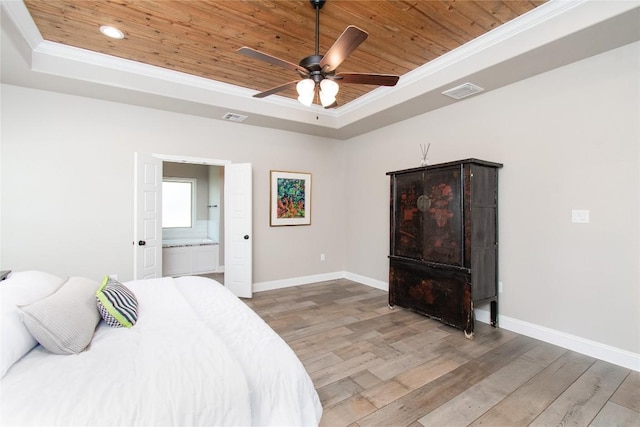 2050 Chalk Mill Xing, Salado, TX 76571 - bedroom featuring a raised ceiling, wooden ceiling, wood finished floors, crown molding, and ensuite bathroom