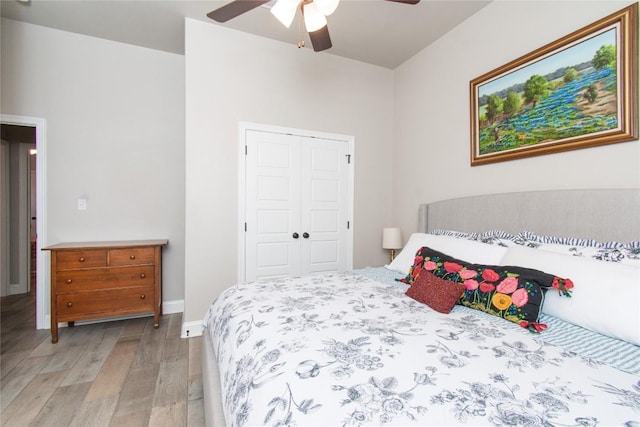 2050 Chalk Mill Xing, Salado, TX 76571 - bedroom featuring light wood-style floors, a closet, and a ceiling fan