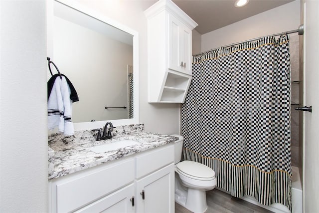 2050 Chalk Mill Xing, Salado, TX 76571 - bathroom featuring vanity, shower / bath combination with curtain, wood finished floors, and recessed lighting