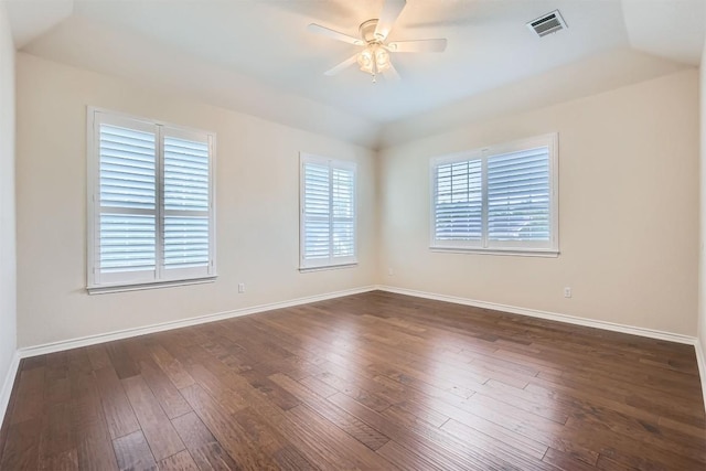 2114 Cliffs Edge Dr, Austin, TX 78733 - empty room featuring dark wood-style floors, a ceiling fan, and vaulted ceiling