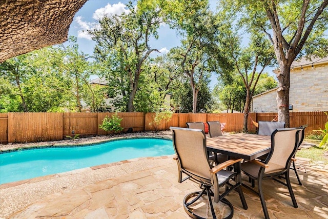 1604 Hughes Dr, Cedar Park, TX 78613 - view of swimming pool with a patio, a fenced backyard, and outdoor dining space