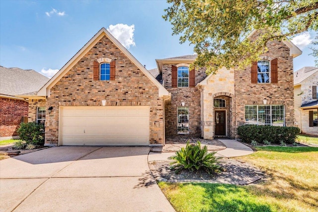 1604 Hughes Dr, Cedar Park, TX 78613 - traditional-style home with concrete driveway, a garage, and brick siding