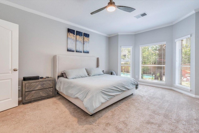 1604 Hughes Dr, Cedar Park, TX 78613 - carpeted bedroom with crown molding and ceiling fan