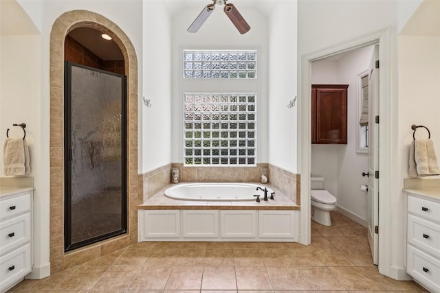 128 Squires Dr, Lakeway, TX 78734 - bathroom with a jetted tub, a stall shower, tile patterned floors, and vanity