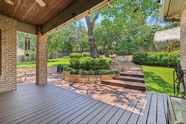 128 Squires Dr, Lakeway, TX 78734 - wooden terrace with a fenced backyard, stairway, and ceiling fan