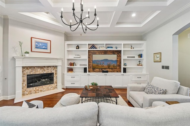 128 Squires Dr, Lakeway, TX 78734 - living room featuring coffered ceiling, crown molding, a chandelier, dark wood-type flooring, and beam ceiling