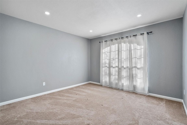 7601 Crackling Creek Dr, Austin, TX 78736 - carpeted empty room with recessed lighting