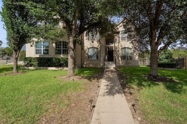 7601 Crackling Creek Dr, Austin, TX 78736 - obstructed view of property with brick siding