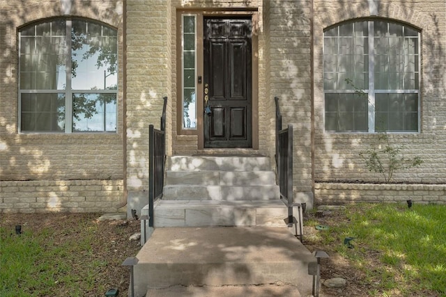7601 Crackling Creek Dr, Austin, TX 78736 - doorway to property with brick siding