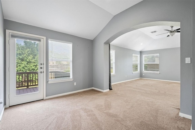 7601 Crackling Creek Dr, Austin, TX 78736 - empty room with vaulted ceiling, a ceiling fan, arched walkways, and carpet flooring