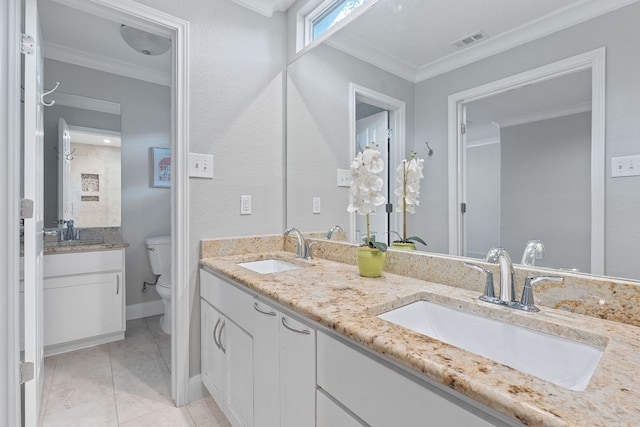1101 Mahan Dr, Austin, TX 78721 - full bath with double vanity, crown molding, and marble finish floors