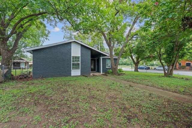 1101 Mahan Dr, Austin, TX 78721 - view of front of house with brick siding