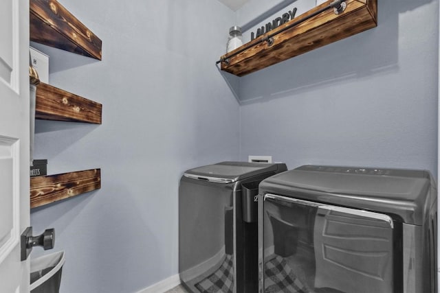 7104 Brick Slope Path, Austin, TX 78744 - laundry room featuring washer and clothes dryer and baseboards