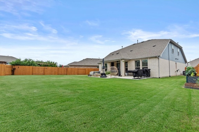 7104 Brick Slope Path, Austin, TX 78744 - back of house featuring a patio and a fenced backyard