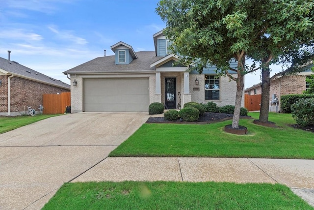 7104 Brick Slope Path, Austin, TX 78744 - view of front facade featuring an attached garage, brick siding, driveway, and roof with shingles