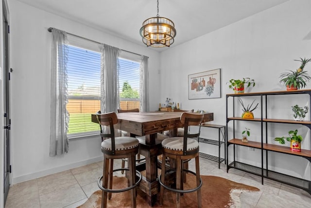 7104 Brick Slope Path, Austin, TX 78744 - dining space featuring a chandelier and light tile patterned floors