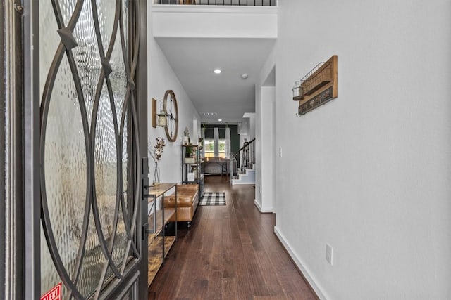 7104 Brick Slope Path, Austin, TX 78744 - entryway with stairway, wood finished floors, and recessed lighting