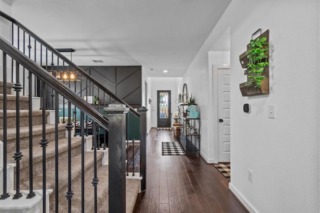 7104 Brick Slope Path, Austin, TX 78744 - entryway featuring stairway, hardwood / wood-style flooring, and recessed lighting