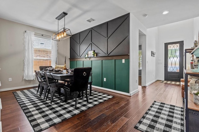 7104 Brick Slope Path, Austin, TX 78744 - dining space with wood finished floors and healthy amount of natural light