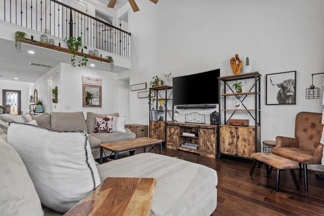 7104 Brick Slope Path, Austin, TX 78744 - living area featuring hardwood / wood-style flooring, ceiling fan, and a high ceiling