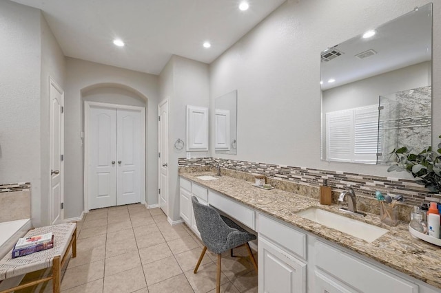 3612 Short Horn Ln, Round Rock, TX 78665 - bathroom featuring double vanity, tile patterned flooring, tiled shower, a bath, and recessed lighting