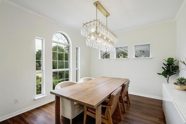 3612 Short Horn Ln, Round Rock, TX 78665 - dining area featuring crown molding, dark wood-style flooring, and a chandelier