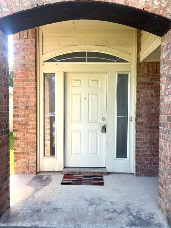15316 Lady Elizabeth Ln, Pflugerville, TX 78660 - entrance to property with brick siding